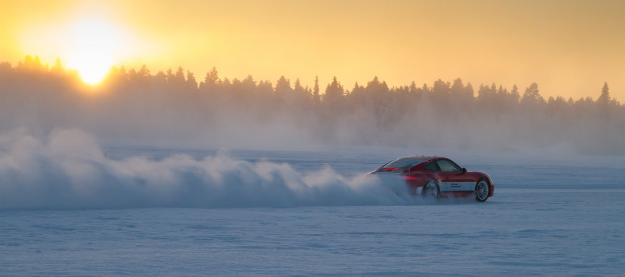 luxury supercar driving on ice in finnish lapland